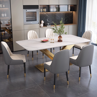 Ensemble table à manger moderne de luxe en acier au carbone, dessus en pierre de marbre, meubles de luxe stables pour villa, maison, appartement, hôtel et restaurant