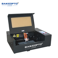 Machine de gravure laser CO2 de table électrique 3020 40W refroidie par eau haute précision AI/DXF/DST pour bois/papier/PVC/cristal/roche