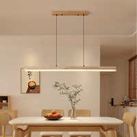 Lustre long suspendu en travertin naturel, style bois naturel moderne et simple, pour escalier ou restaurant.
