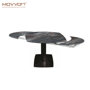 <span class=keywords><strong>Table</strong></span> de salle à manger extensible en céramique avec base en métal blanc avec dessus <span class=keywords><strong>pivotant</strong></span> laminé ovale - Product Image 1