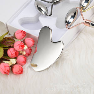 Luma Grado Medico Guasha raschiatura in acciaio inox strumento di terapia di massaggio mano mano Gua Sha Board con rullo di giada - Product Image 2