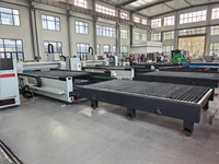 Machine de découpe laser à fibre industrielle avec table d'échange, supportant la découpe multi-gaz (air, oxygène, azote)