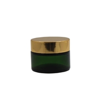 Vente en gros 20g 30g 50g pot de crème vide en verre vert avec couvercle en or conteneur d'emballage cosmétique