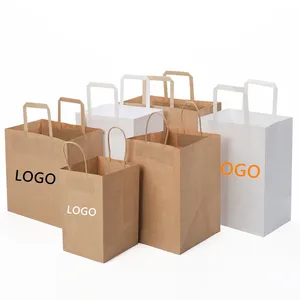 Prezzo di fabbrica sacchetto di carta marrone kraft riciclabile con manico in corda il tuo logo sacchetto di carta kraft con manico piatto