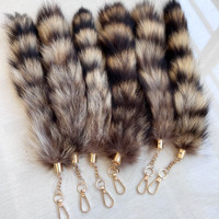 Véritable fourrure de raton laveur queue clé accessoires en peluche voiture électrique porte-clés queue de fourrure naturelle femmes sac suspendus ornements fille cadeau