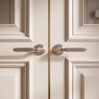 Poignée de porte à levier cannelée ISILINE en laiton massif nickelé PVD avec roseau concentrique et embout conique pour intérieur