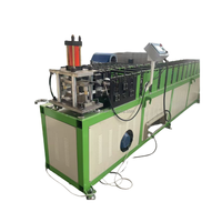 Machine de fabrication de tôles pour portes à enroulement en PVC, aluminium et acier inoxydable, la plus vendue, avec moteur PLC et sécurité élevée