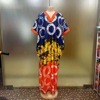 Fabricant de Robe Femme Imprimée Tendance Africaine à Col en V Ample, avec Poches, d'Influence Ethnique Moyen-Orientale, Nouveau Modèle pour l'Été 2024