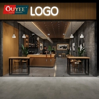 Comptoir de café moderne Ouyee, mobilier design pour salon de thé, décoration intérieure de magasin de bubble tea, comptoir de bar pour café