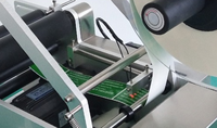 Machine d'étiquetage semi-automatique à bas prix pour bouteilles rondes/machine d'impression d'étiquettes de bouteilles en PET