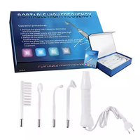 Appareil d'électrothérapie faciale portable haute fréquence JX-006A de haute qualité avec 4 tubes en verre pour une thérapie cutanée efficace