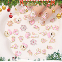 Accessoires de Noël en gros en alliage métallique rose, motifs mignons de dessins animés, strass 3D, breloques chaussettes, chapeaux, cerfs, arbres, flocons de neige pour nail art