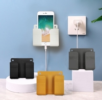 Support de charge pour téléphone portable, support mural adhésif, support de télécommande, boîte de rangement