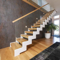 Escalier personnalisable en bois et acier à double poutre en forme de Z pour appartement duplex moderne, loft, hôtel avec garde-corps en verre