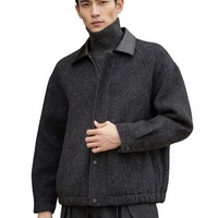 Veste à col montant gris foncé à manches longues et boutonnée pour l'automne et les trajets quotidiens