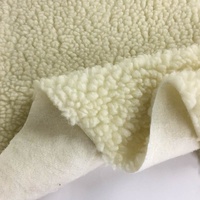 Tissu en fausse fourrure de sherpa en laine, tricotage à la chaîne, longueur du poil de 16 mm, 100 % laine, fond en polyester
