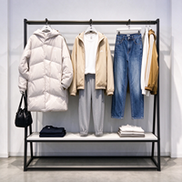 Porte-vêtements en métal noir, table ronde à niveaux, étagère grise, tringle de suspension, CE ETL, vente en gros, vente au détail, boutique