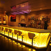 Comptoir de bar de casino en forme de L avec éclairage LED à changement de couleur personnalisé, design esthétique et nouveau