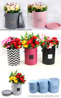 Boîte à fleurs ronde en carton de luxe avec poignée en ruban personnalisée de haute qualité