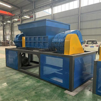 Ligne de recyclage complète en plastique haute résistance, broyeur à double arbre de 75 kW pour vêtements usagés, tissus et mousse