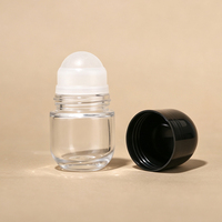 Flacon roll-on en verre de 50 ml en forme de capsule pour déodorant, huile corporelle, emballage cosmétique, avec capuchon dôme noir et blanc