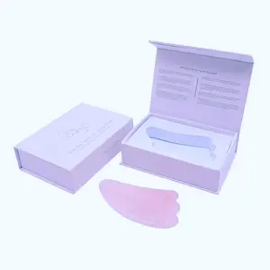 Caja de cosméticos con forma de libro de diseño personalizado, rodillo de jade magnético de impresión, caja de papel de regalo gua sha con espuma blanca