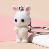 Vente en gros de peluche résine 3D lapin porte-clés flocage mignon lapin pompon porte-clés sac breloques animaux poupée résine Couple porte-clés