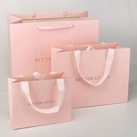 Sacs en papier cartonné personnalisés de haute qualité, sacs cadeaux roses pour vêtements et sous-vêtements, pour les petites entreprises, avec poignée en ruban
