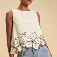 Chemisier d'été décontracté ample à col rond sans manches pour femme avec broderie florale