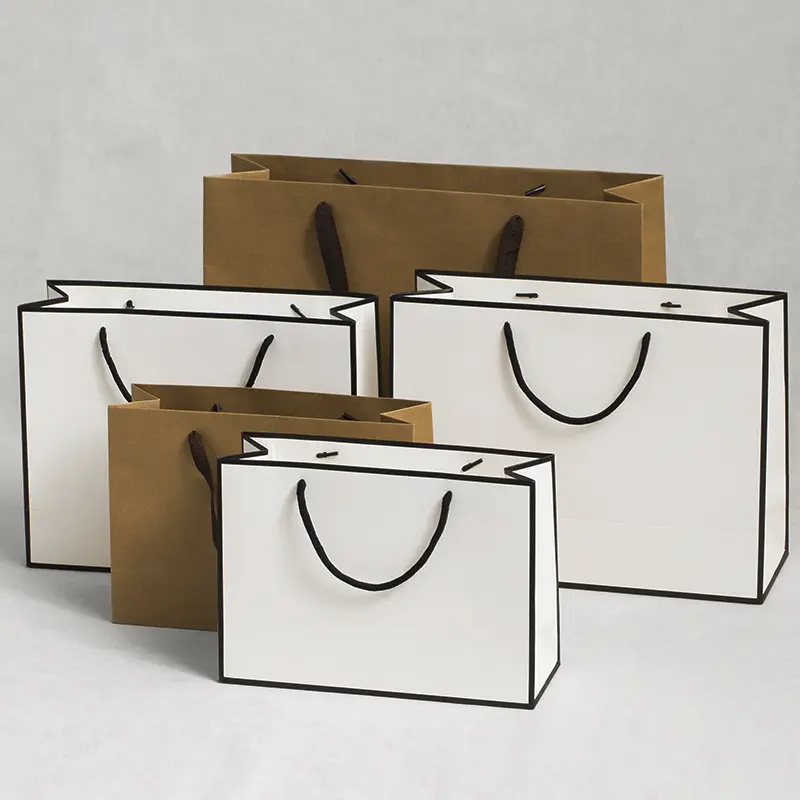 Özel logo lüks siyah parlak kağıt alışveriş torbası toptan baskılı perakende hediye zanaat takı kozmetik ambalajlama için kağıt torbalar