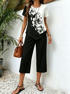 Conjunto de 2 piezas con estampado floral de nueva moda para mujer, top de manga corta con dobladillo asimétrico + pantalones cortos, conjunto informal de verano - Product Image 5