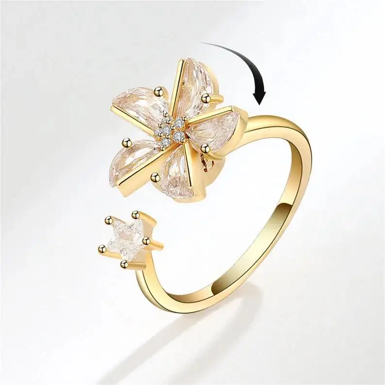 2023 vente chaude conception de haute qualité 18k plaqué or cubique Zircon lune fleur ouverture anneau rotatif fleur anneau pour les femmes