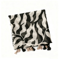 Nouvelle collection été Malaisie : Écharpe longue légère en viscose noire pour femme, motif fantaisie feuilles et fleurs, avec détails à pompons