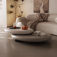 Hochwertiger Moderner Kleiner Wohnungs-Couchtisch aus Holz Drehbar Oval Kieselstein-Design Leichter Luxus Einfach Kreativ Spezialform