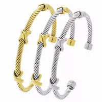 Fabricant de bijoux OEM ODM Bracelet de mode multi câble torsadé en fil croisé Bracelet de marque deux tons Bijoux personnalisés