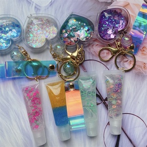 LLavero de acrílico líquido con Base de brillo de labios para niños, cadena para llaves, cosméticos, Pintalabios con pompón, venta al por mayor - Product Image 2