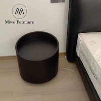 Table de chevet moderne et simple noire avec tiroir, meuble de rangement circulaire, table de chevet design pour chambre à coucher