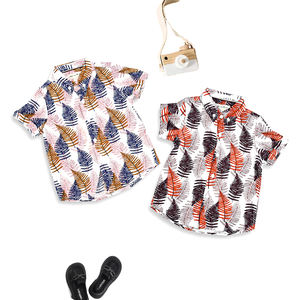 Chemises boutonnées hawaïennes à manches courtes en coton personnalisé <span class=keywords><strong>Chemise</strong></span> imprimée pour garçon de plage taille européenne et américaine pour enfant - Product Image 1
