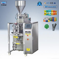 Machine d'emballage verticale automatique avec fonction de remplissage pour films/plastiques, moteur haute précision pour chips, bonbons, granulés, biscuits