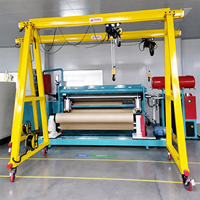 Prix d'usine Grue portique mobile robuste de 1 à 2 tonnes à hauteur réglable avec structure en acier pour levage en atelier