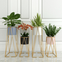 Nouveaux pots de fleurs et jardinières en métal doré pour plantes d'intérieur, grands et volumineux, vente en gros, à prix abordable, avec support