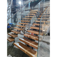 Escalier à monolamelles de précision, garde-corps en verre, marches en bois de hêtre européen, artisanat de qualité axé sur le détail