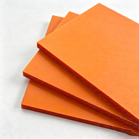 Support de découpe de panneaux en bakélite rouge-orange sur mesure pour pièces isolantes d'équipements électriques