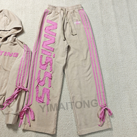 Conjunto Deportivo Personalizado para Mujer: Top Corto, Pantalones Largos Acampanados, Sudadera con Cremallera, Lavado Ácido, Bordado Desgastado y Parches