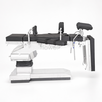 Table chirurgicale avec traction et extension en fibre de carbone pour la chirurgie des fractures de la hanche
