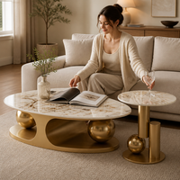 Table basse ovale en pierre légère de style italien, table d'appoint double boule de luxe léger et simple pour la maison, combinaison tendance