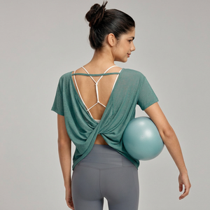 Camiseta deportiva de yoga para mujer, holgada, con espalda cruzada, manga corta, transparente, ligera, transpirable, para gimnasio, pilates y entrenamiento. - Product Image 1