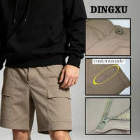 Shorts de travail à poches verticales pour hommes, couleur taupe, taille élastique, braguette boutonnée, passants de ceinture, poches à bouton-pression, coupe ample, longueur mi-cuisse, pour la randonnée
