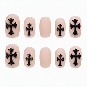 Faux ongles à presser rose nude couvrants avec motif croix noire 3D, pré-conçus pour les doigts - Product Image 1