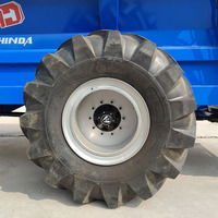 Épandeur de fumier de vache et de paillis agricole Hinda robuste, remorqué, entraîné par prise de force, à double disque et double axe, capacité 10m³, portée 8-14m